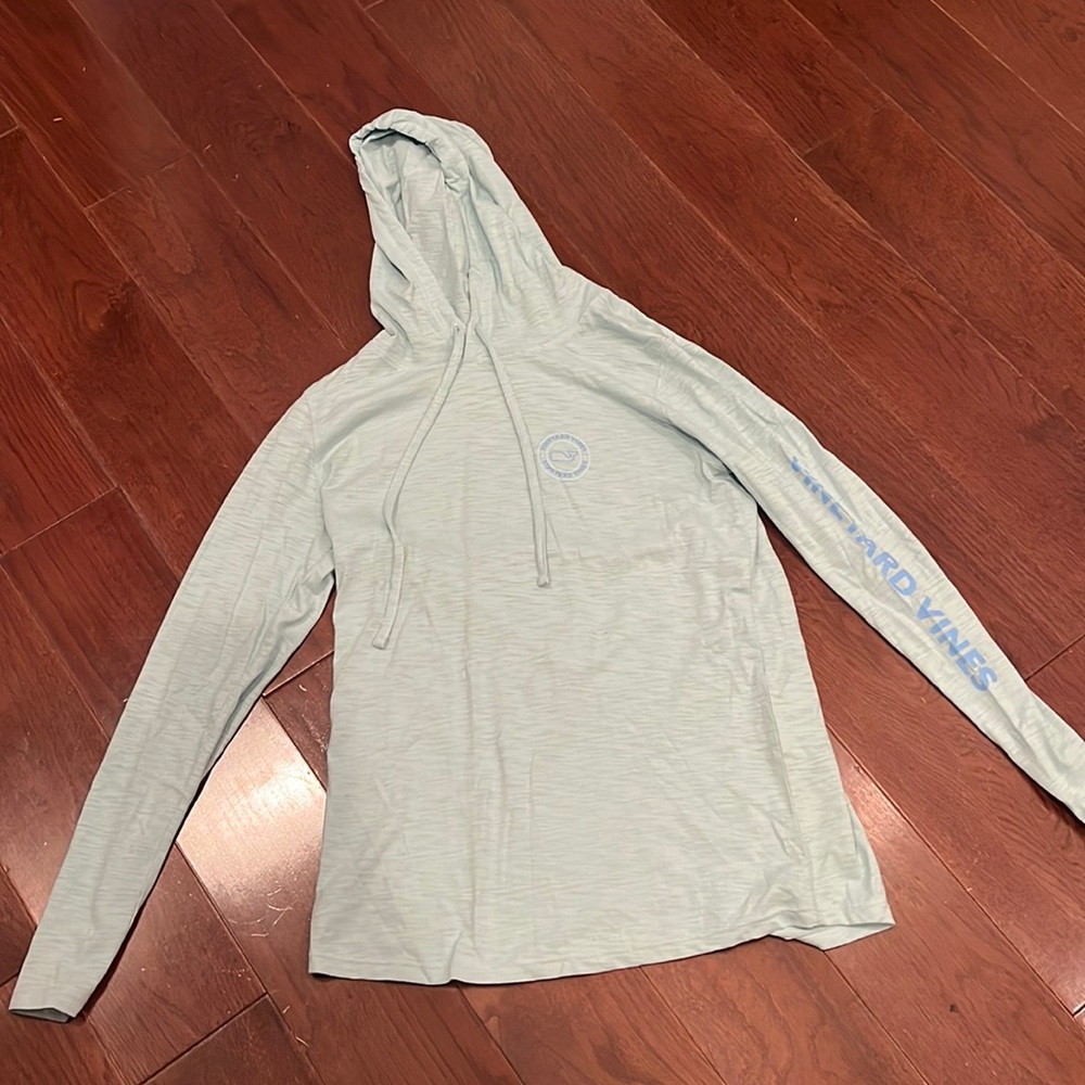 light blue Vineyard Vines shirt.